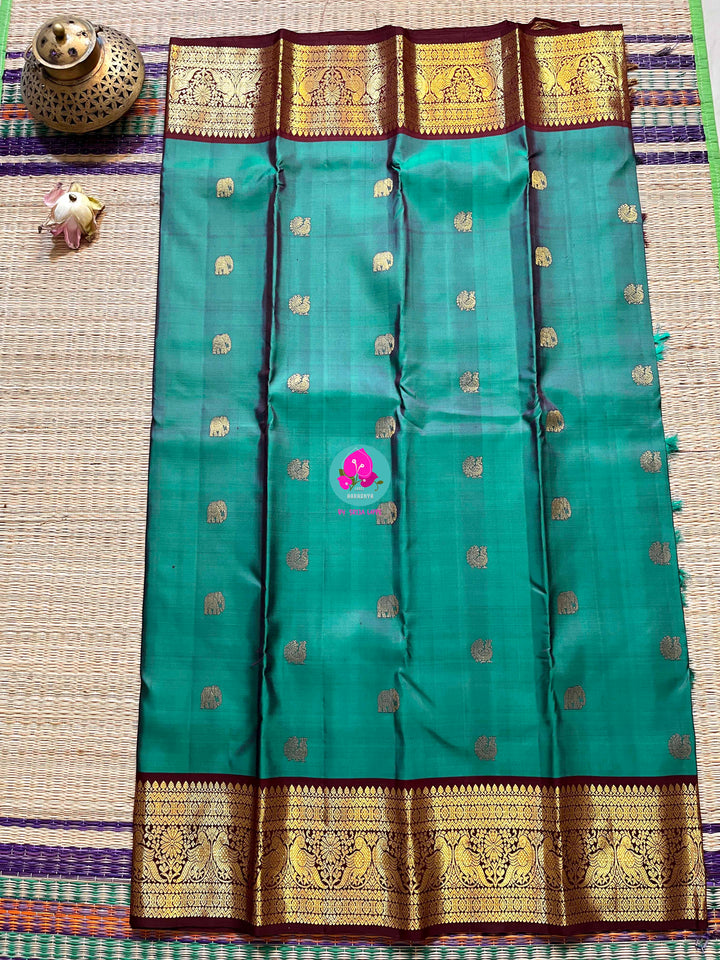 Peacock Blue with brown border