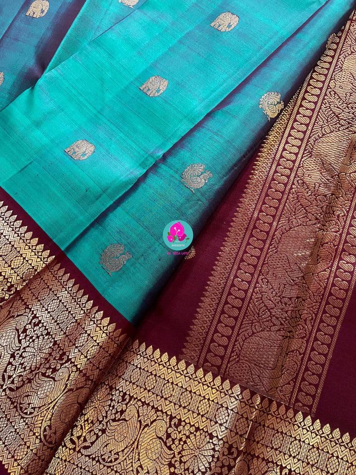 Peacock Blue with brown border