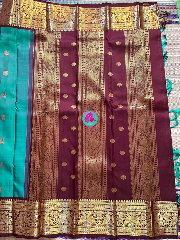 Peacock Blue with brown border