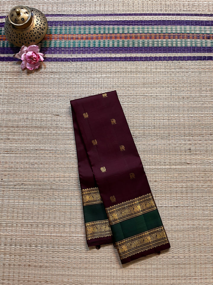 2g Zari Kanchipattu saree in Brown and bottle green