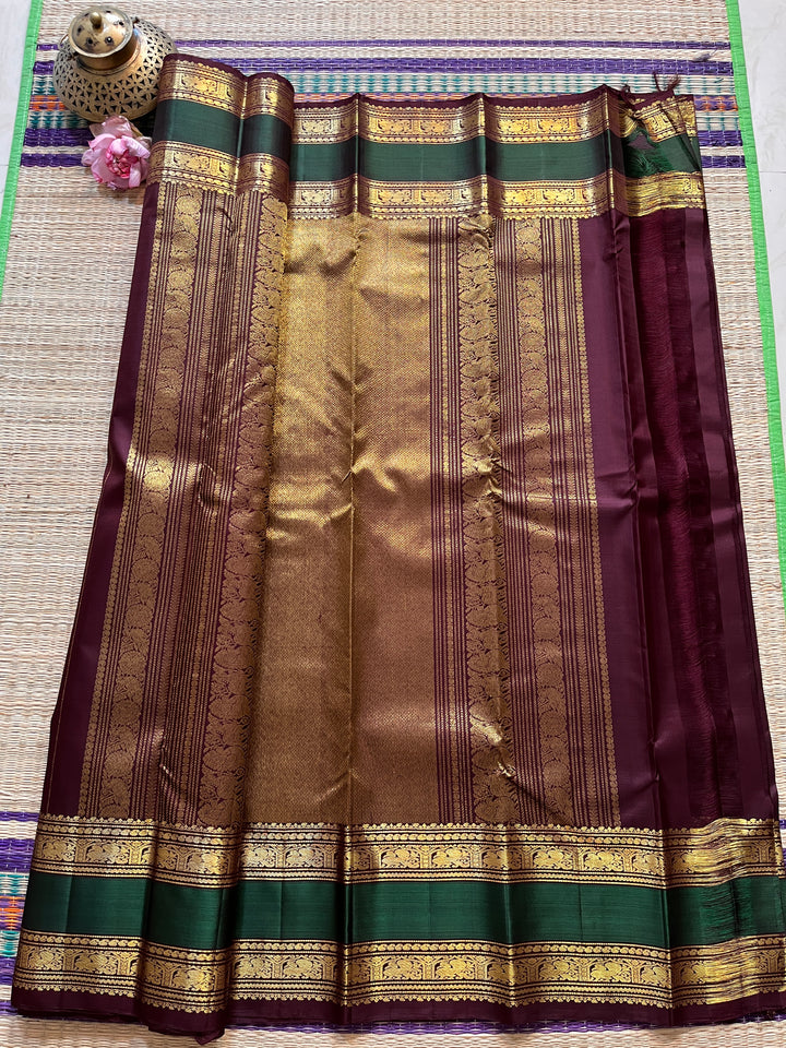 2g Zari Kanchipattu saree in Brown and bottle green