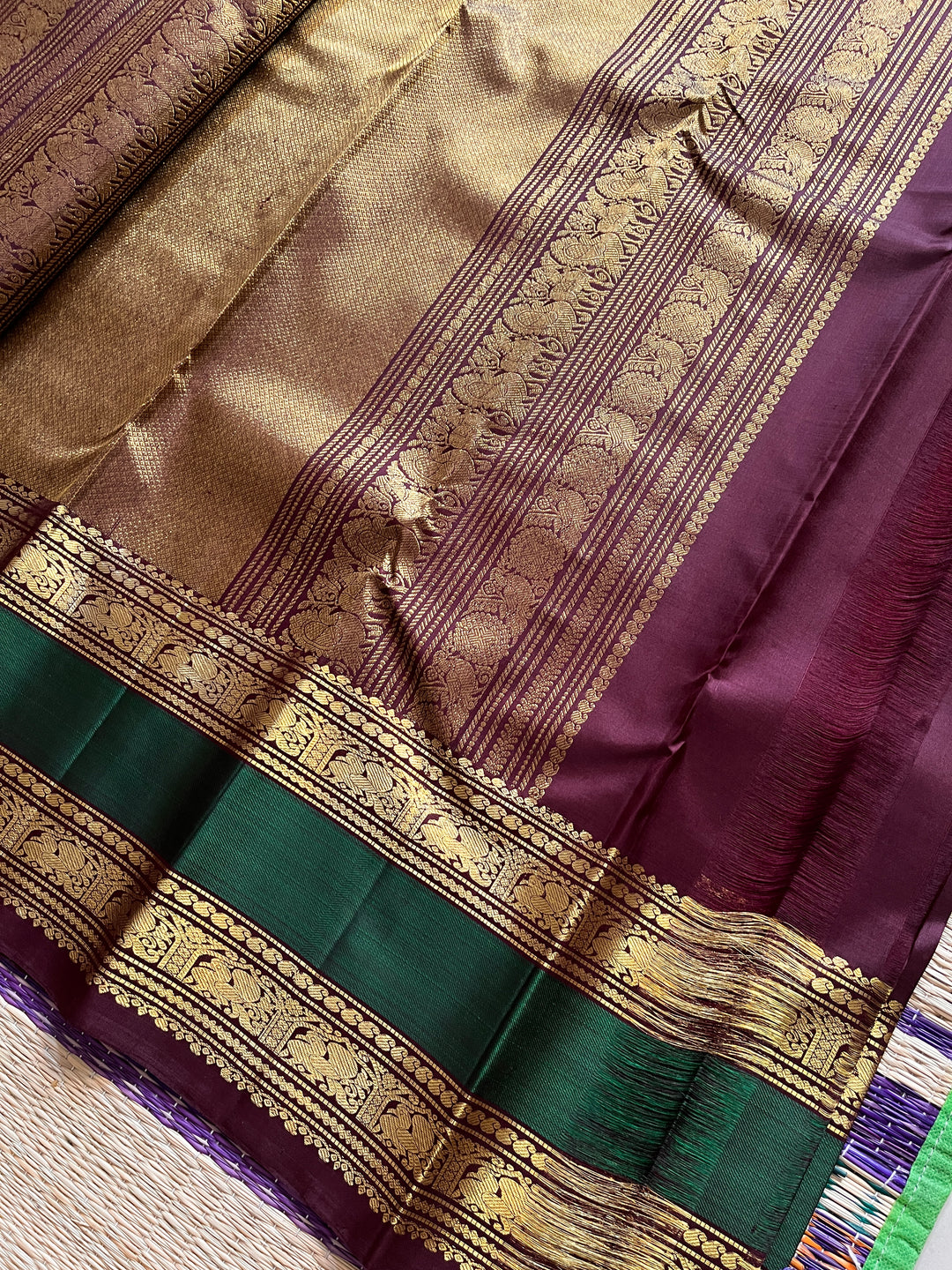 2g Zari Kanchipattu saree in Brown and bottle green