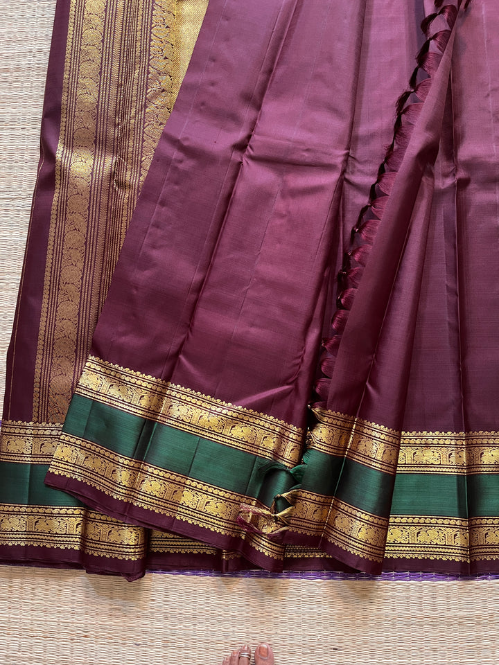 2g Zari Kanchipattu saree in Brown and bottle green