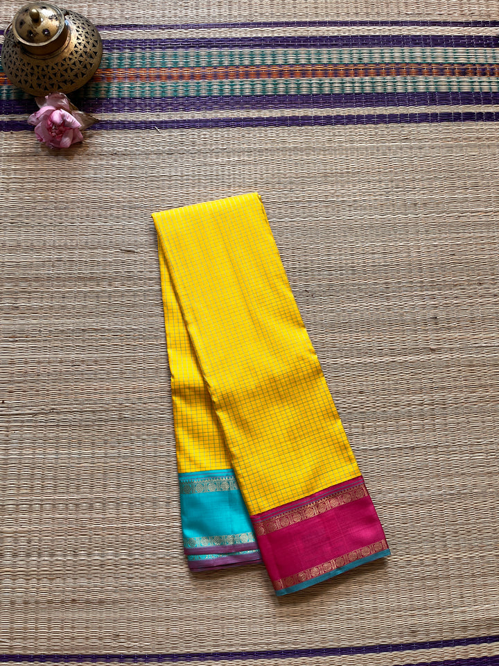 Pure zari Kanchipattu saree with madras checks and Ganga Jamuna border