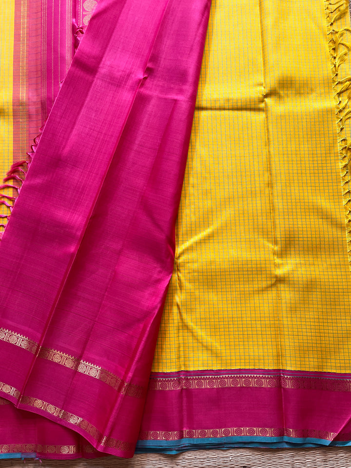 Pure zari Kanchipattu saree with madras checks and Ganga Jamuna border