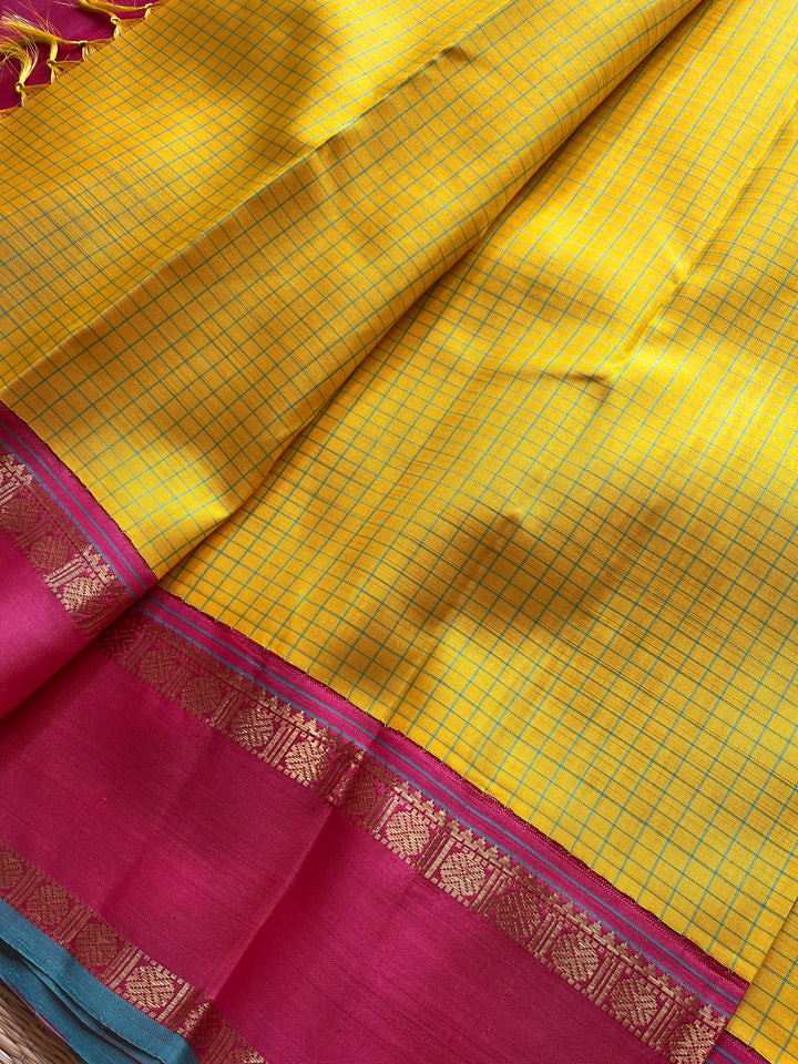 Pure zari Kanchipattu saree with madras checks and Ganga Jamuna border