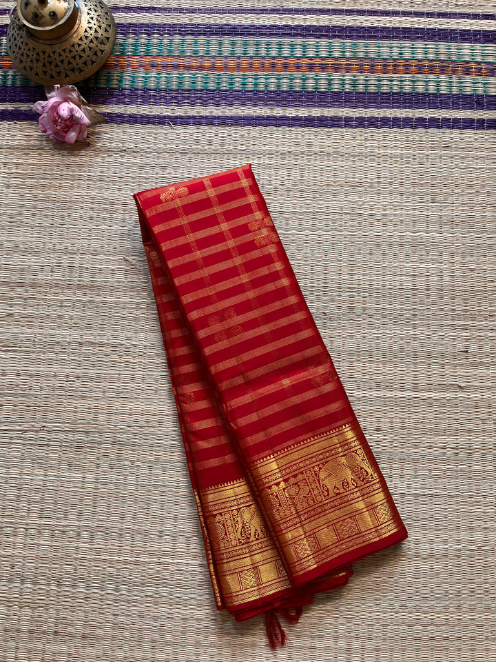Red Kanchipattu saree in traditional motifs with borders