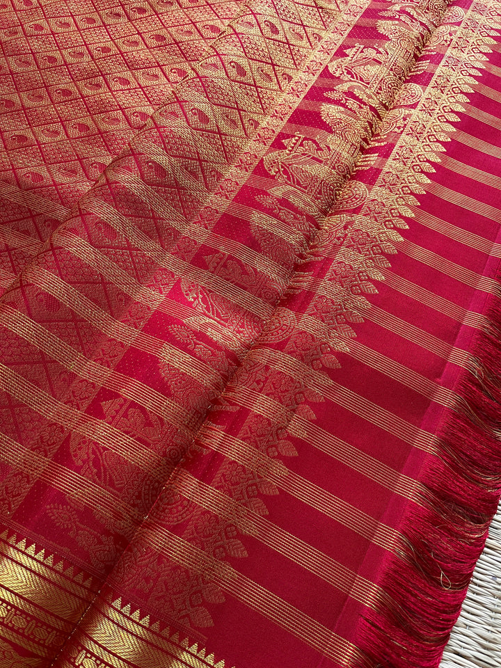 Red Kanchipattu saree in traditional motifs with borders
