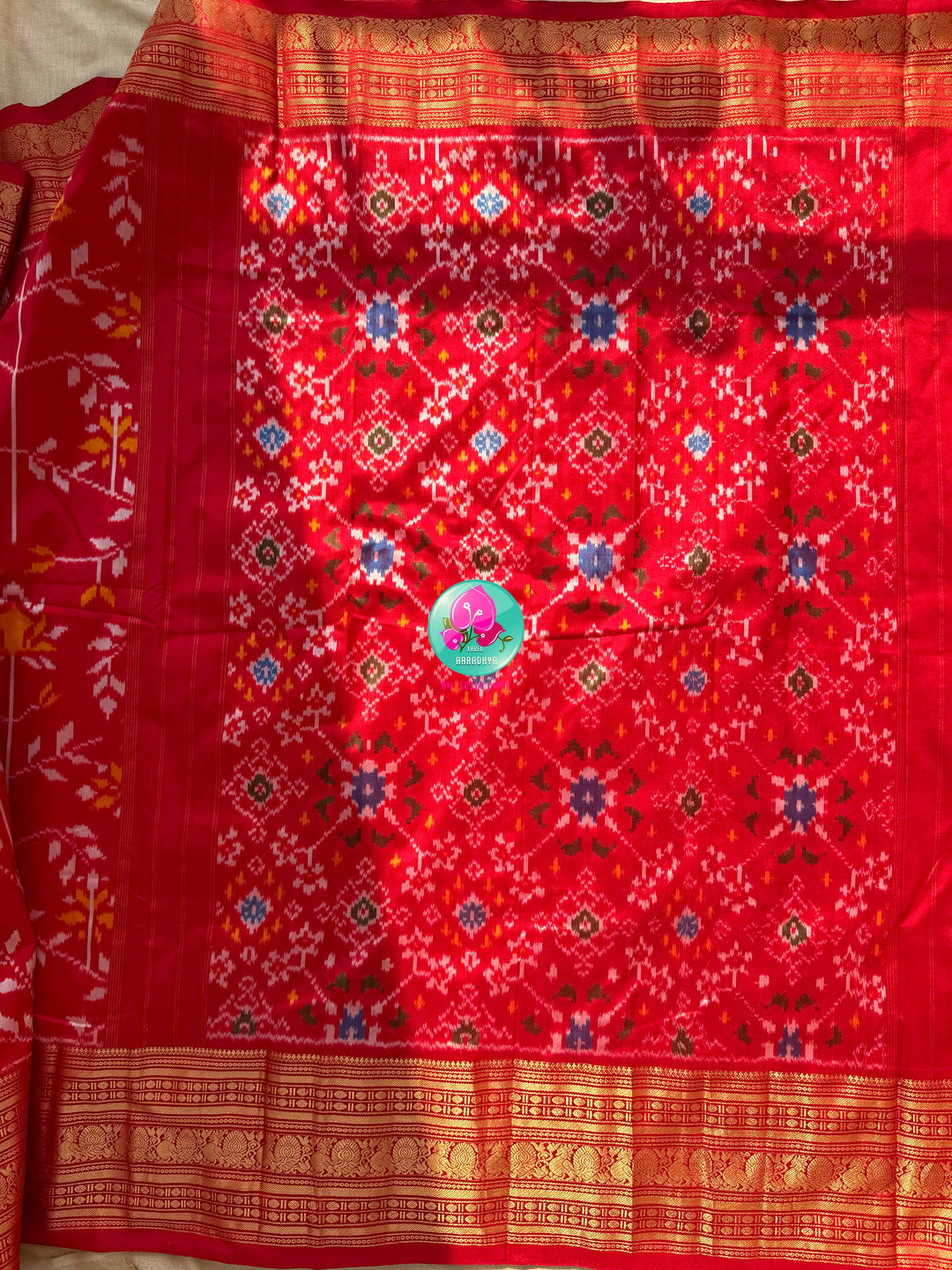 Crimson Flame & Gilded Glass: Bright Red Ikkat Silk with Kanchi Heritage