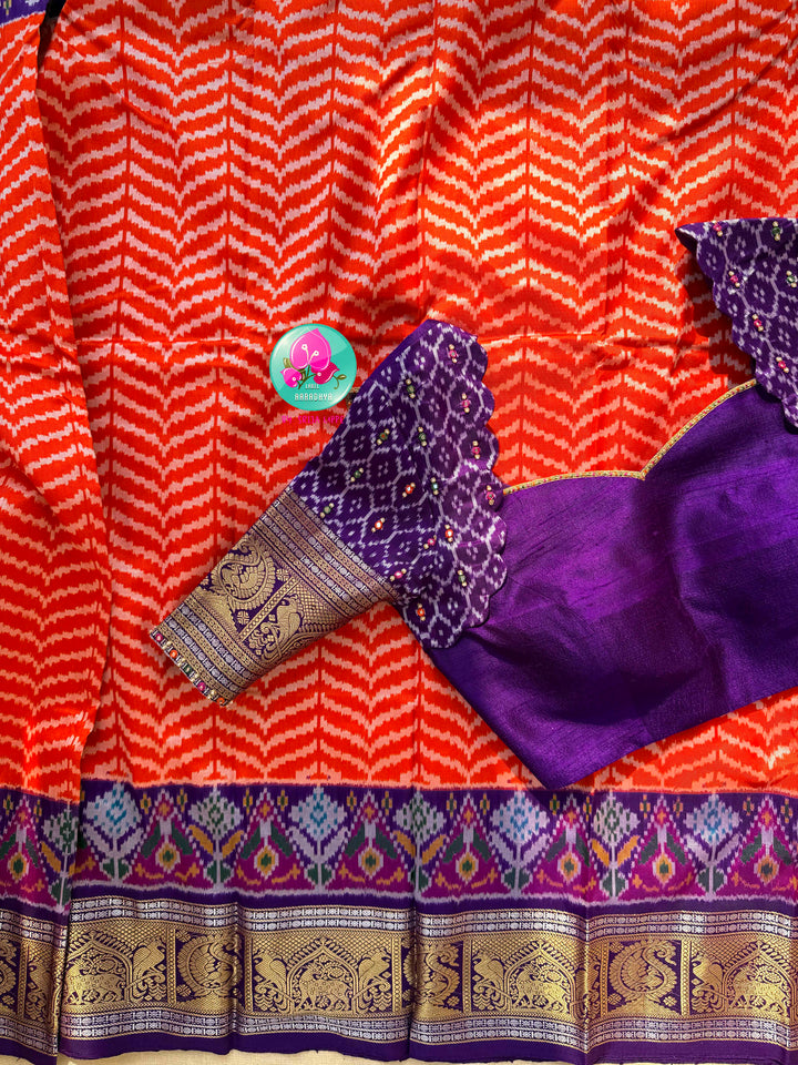 Sunset Waves: Leheriya Orange Ikkat Silk Saree with Kanchi Heritage Border