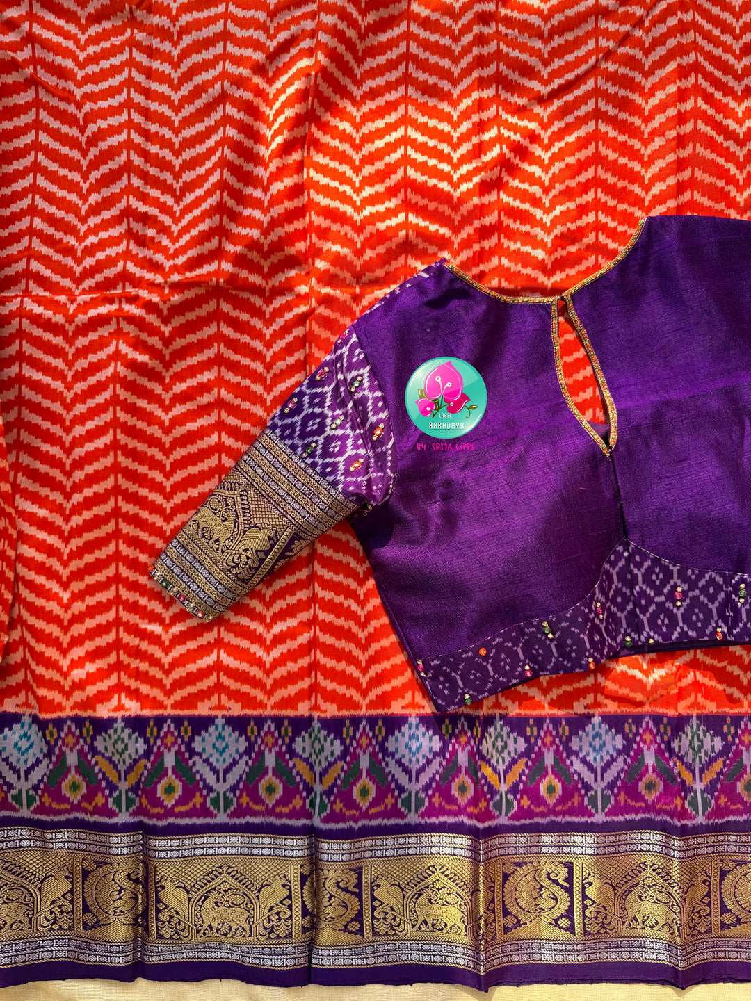 Sunset Waves: Leheriya Orange Ikkat Silk Saree with Kanchi Heritage Border