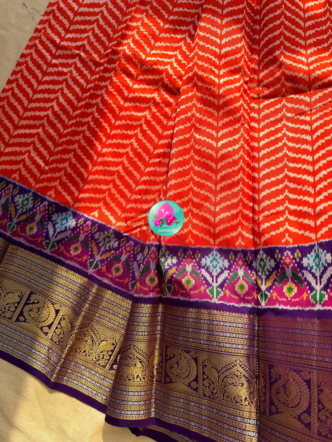 Sunset Waves: Leheriya Orange Ikkat Silk Saree with Kanchi Heritage Border