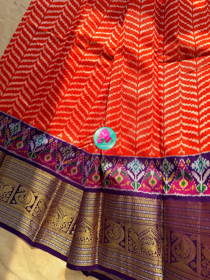 Sunset Waves: Leheriya Orange Ikkat Silk Saree with Kanchi Heritage Border