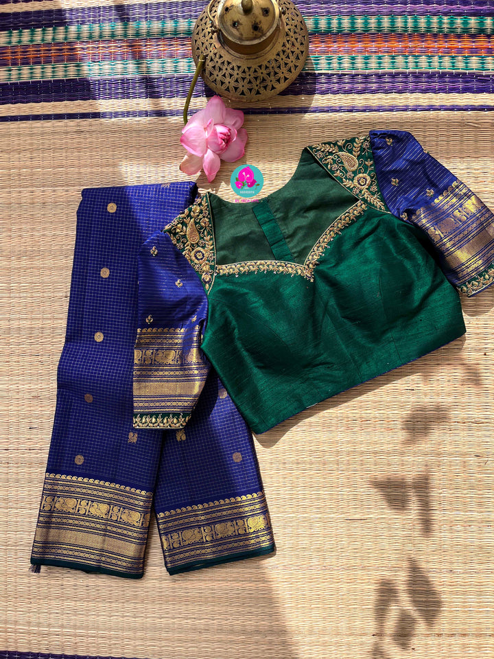 2g zari Vaira Oosi check butta saree in beautiful shade of blue with Hand Embroidered Peacock color fusion Blouse