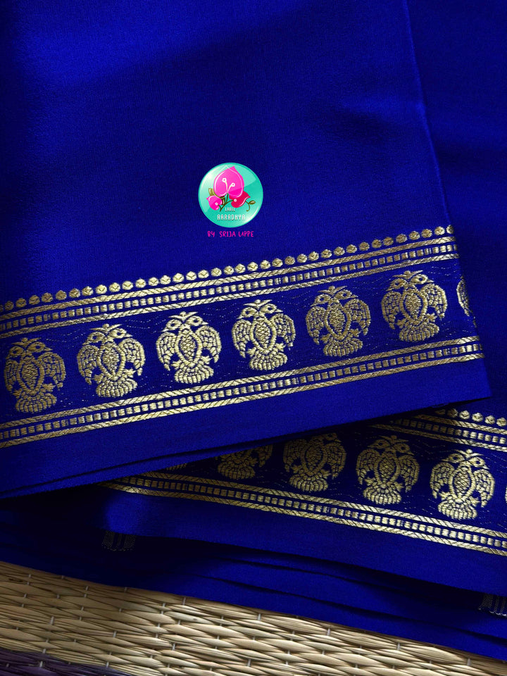The Sapphire Crest: Pure Blue Mysore Silk Saree with Gandaberunda Heritage