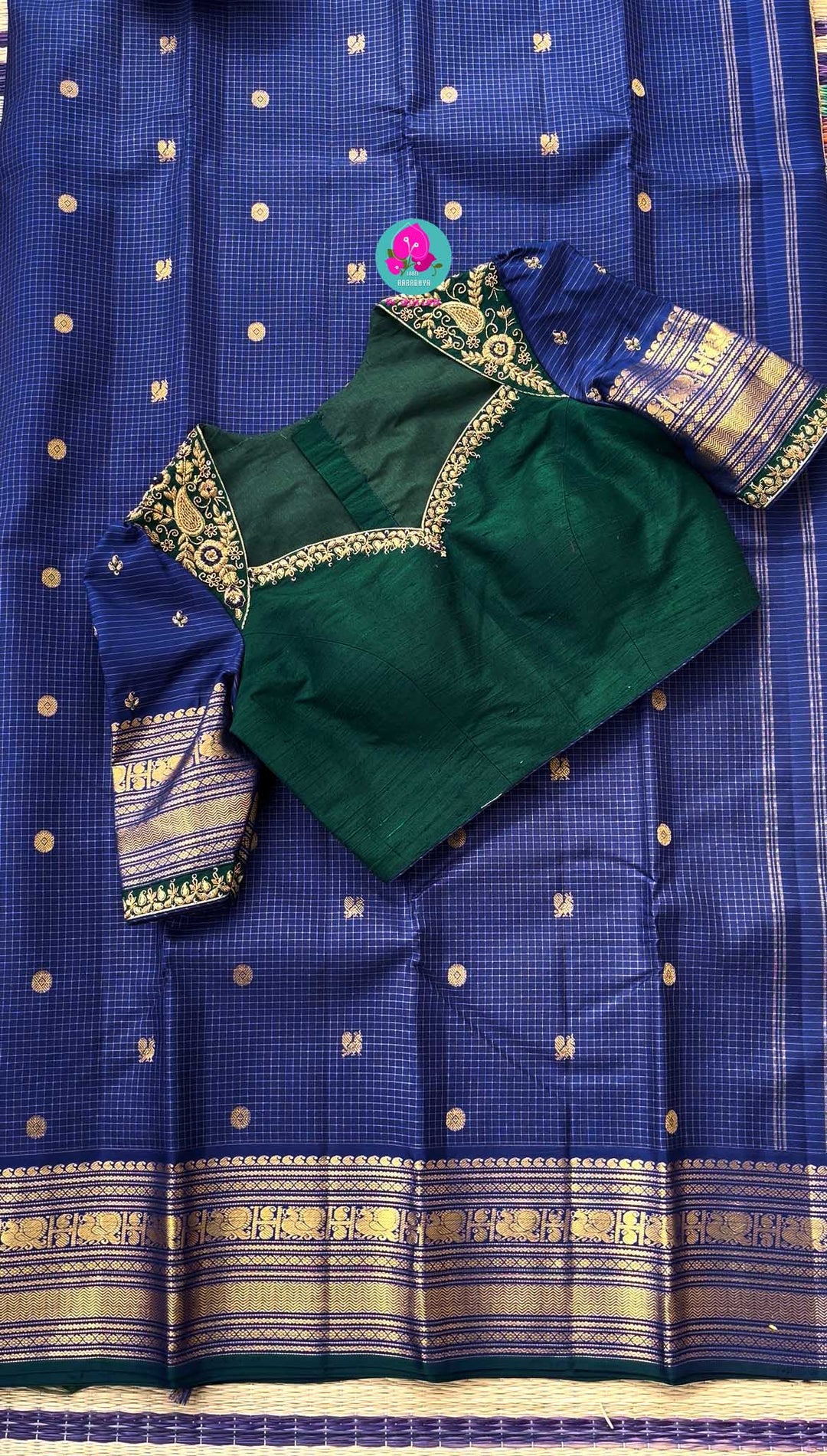 2g zari Vaira Oosi check butta saree in beautiful shade of blue with Hand Embroidered Peacock color fusion Blouse