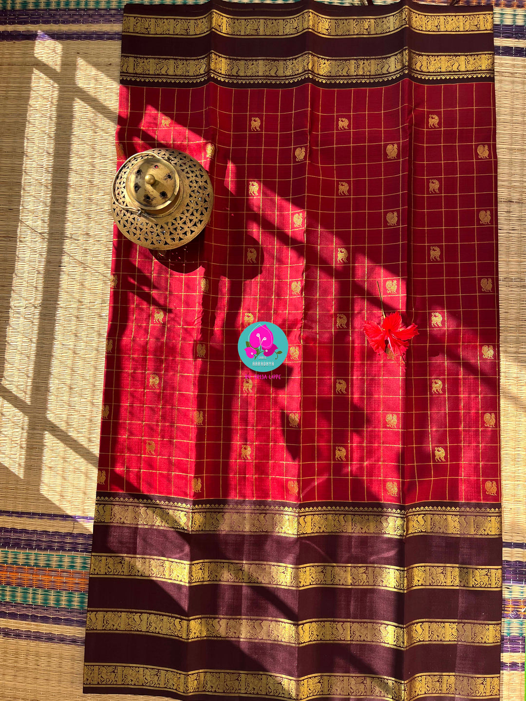A Symphony of Checks: Crimson Red & Brown Kanchipattu Saree with Hand-Embroidered Artisan Details