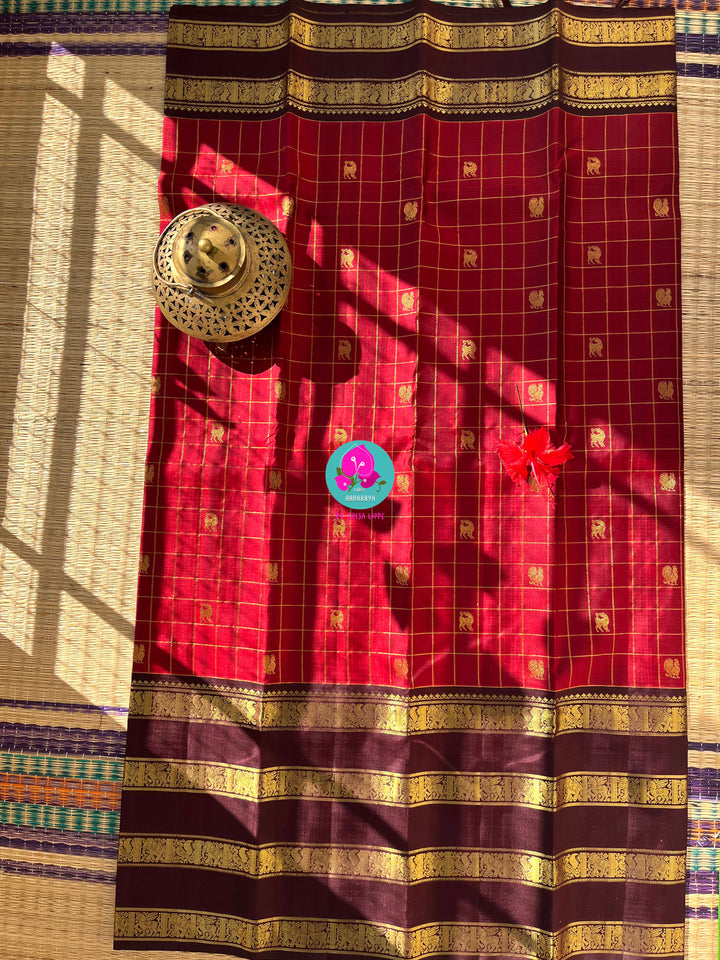 A Symphony of Checks: Crimson Red & Brown Kanchipattu Saree with Hand-Embroidered Artisan Details