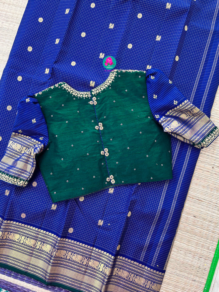 2g zari Vaira Oosi check butta saree in beautiful shade of blue with Hand Embroidered Peacock color fusion Blouse