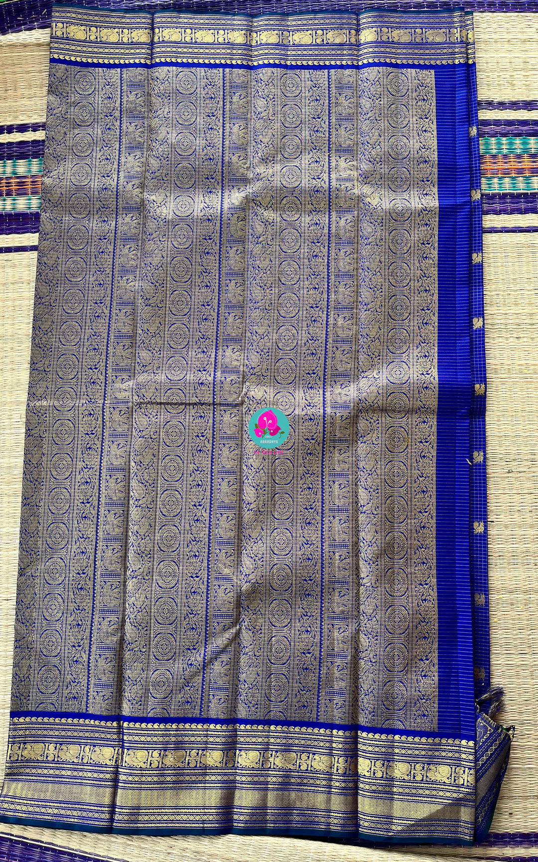 2g zari Vaira Oosi check butta saree in beautiful shade of blue with Hand Embroidered Peacock color fusion Blouse