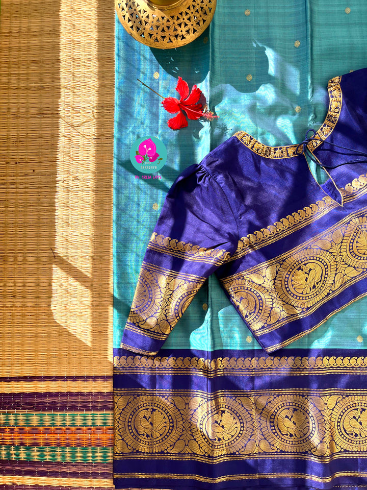 Azure Symphony: Pastel & Royal Blue 2G Zari Kanchipattu Saree with Hand-Embroidered Blouse
