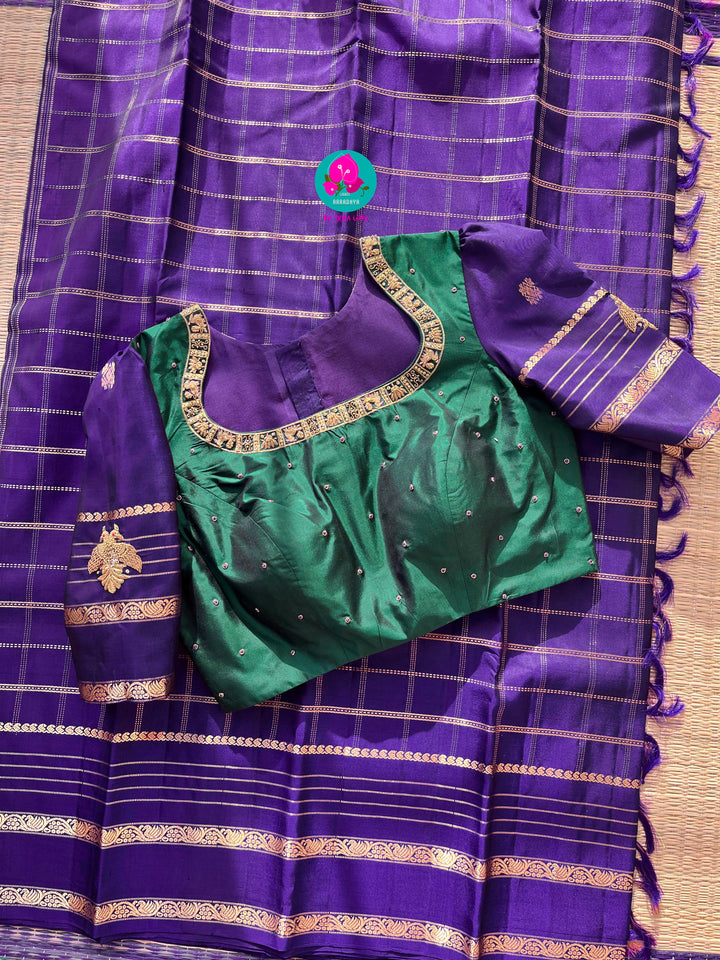 Pure Kanchipattu Checkered saree in beautiful shade of purple and Hand embroidered blouse