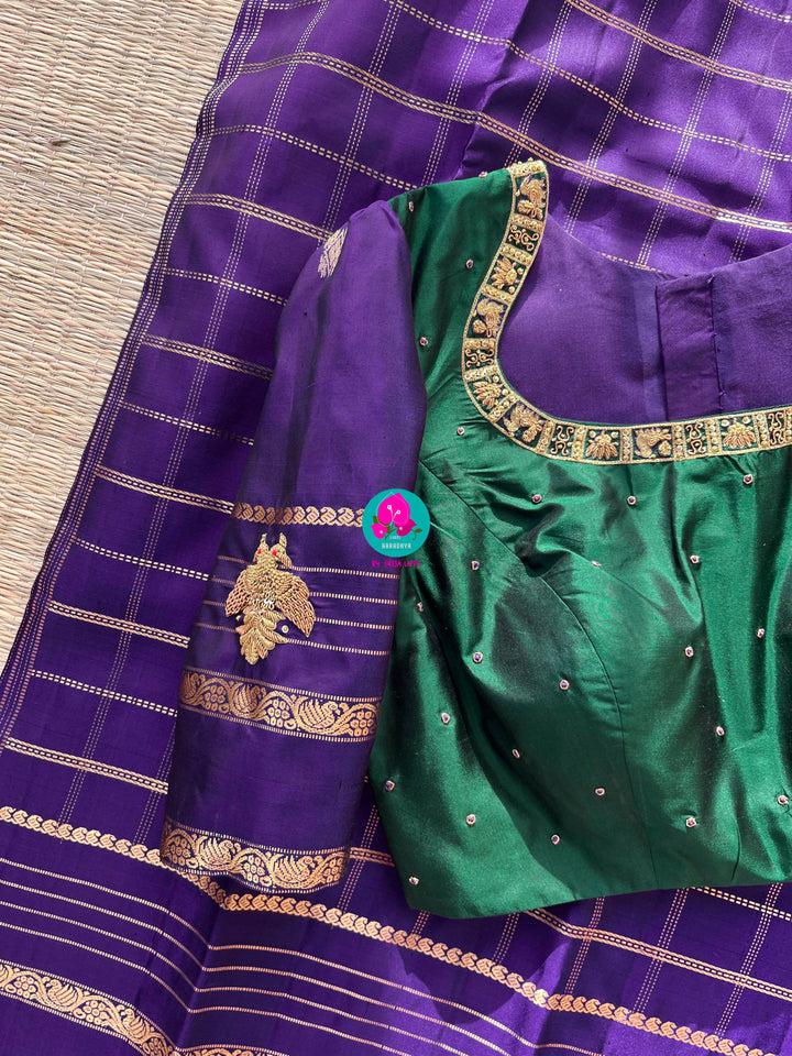 Pure Kanchipattu Checkered saree in beautiful shade of purple and Hand embroidered blouse