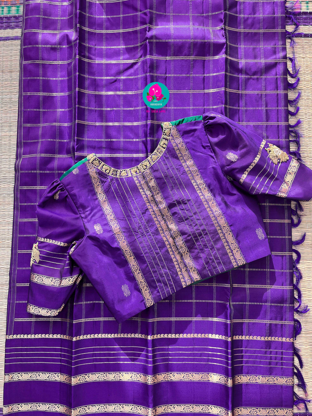 Pure Kanchipattu Checkered saree in beautiful shade of purple and Hand embroidered blouse