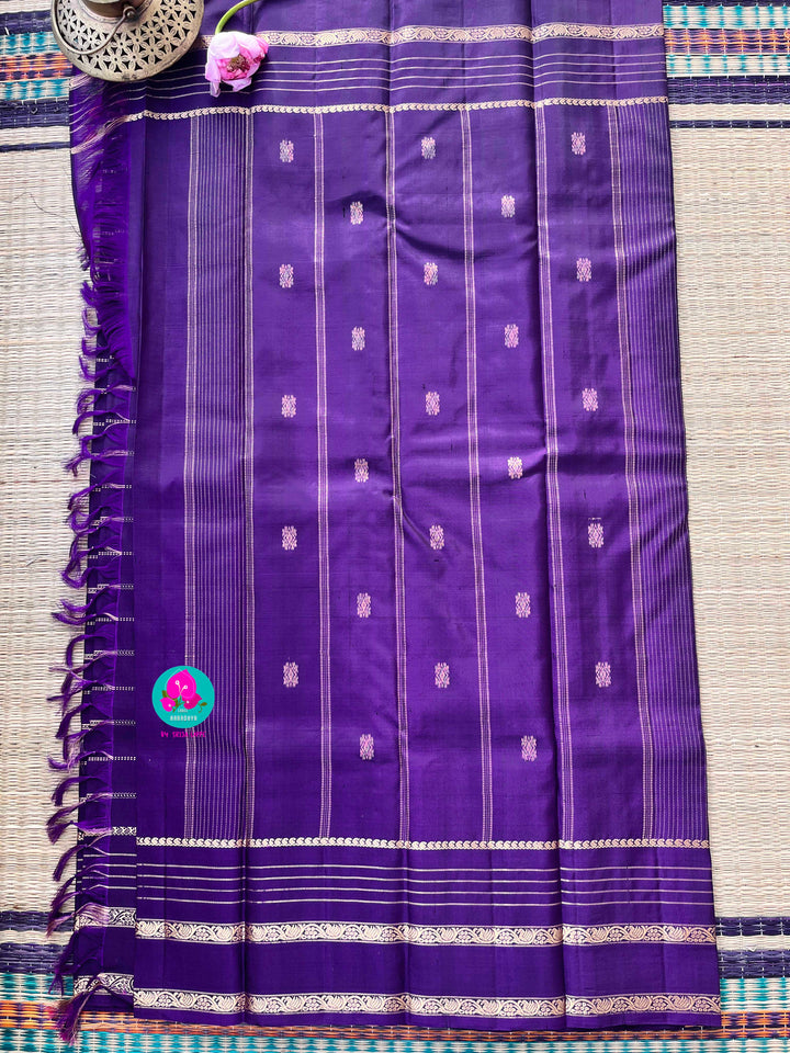 Pure Kanchipattu Checkered saree in beautiful shade of purple and Hand embroidered blouse