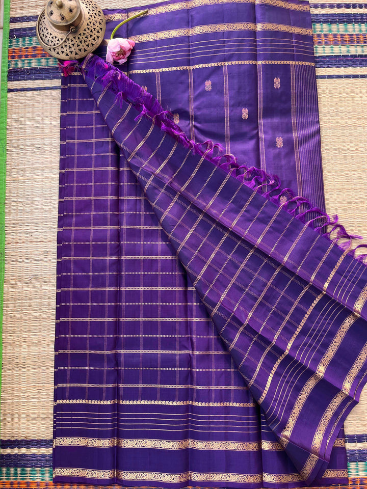 Pure Kanchipattu Checkered saree in beautiful shade of purple and Hand embroidered blouse
