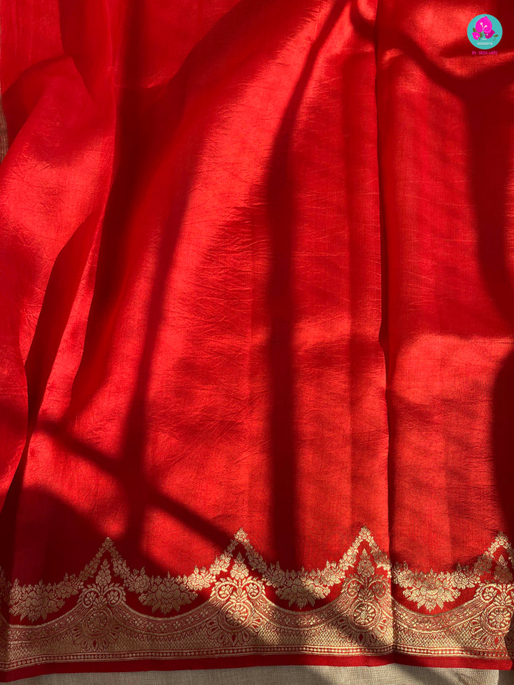 Pure Raw Mango Silk Saree with Scallop style border paired with Pure raw silk blouse
