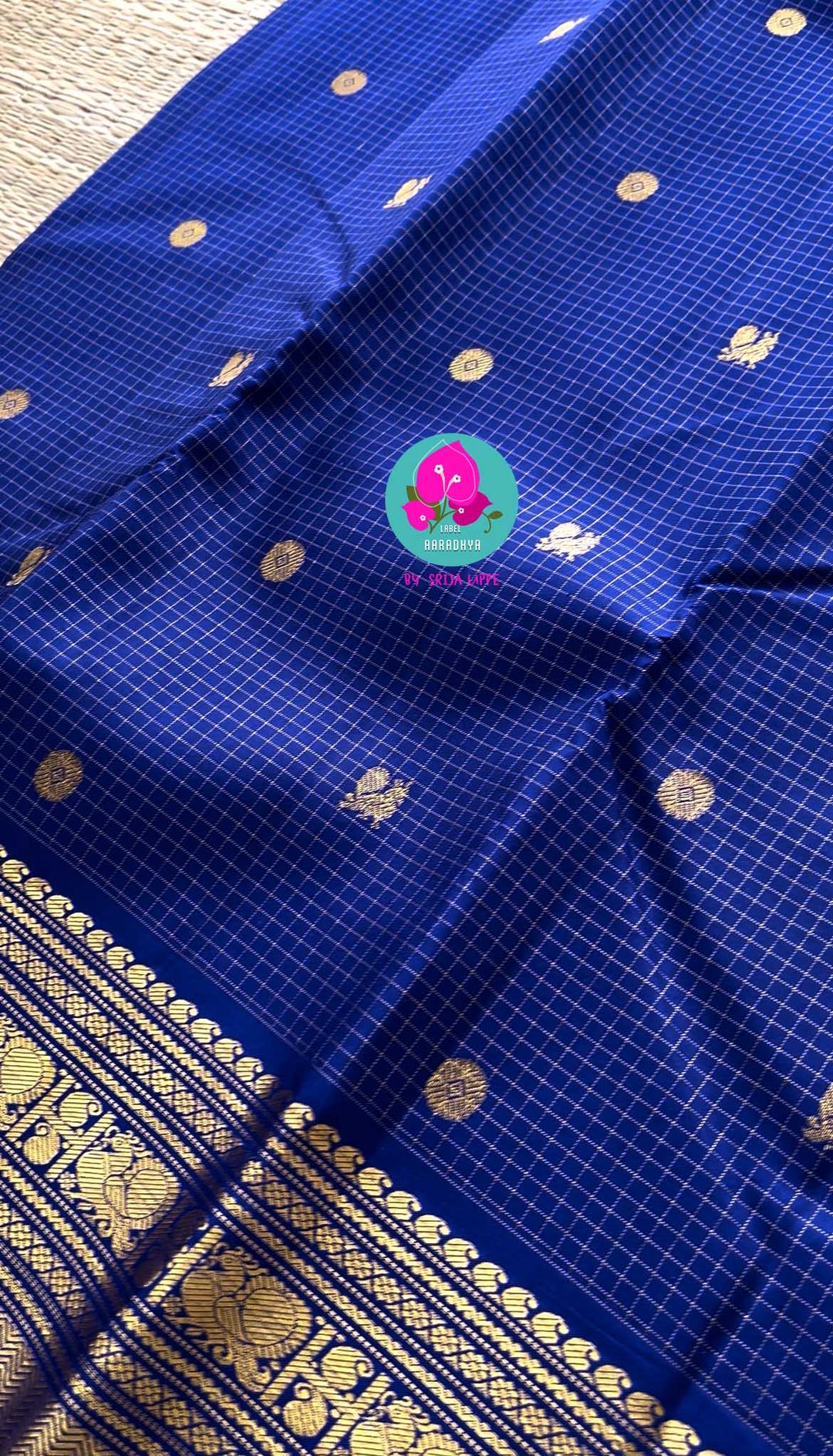 2g zari Vaira Oosi check butta saree in beautiful shade of blue with Hand Embroidered Peacock color fusion Blouse