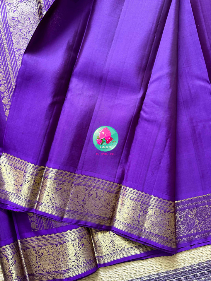 Royal Amethyst: Pure Purple Kanchipattu Handloom Saree with Traditional Gilded Border