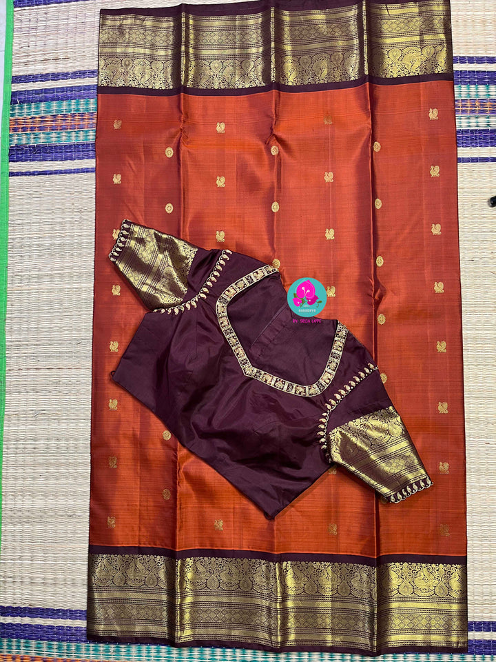 Pure Kanchipattu saree in vintage rust orange and brown border with hand embroidered blouse