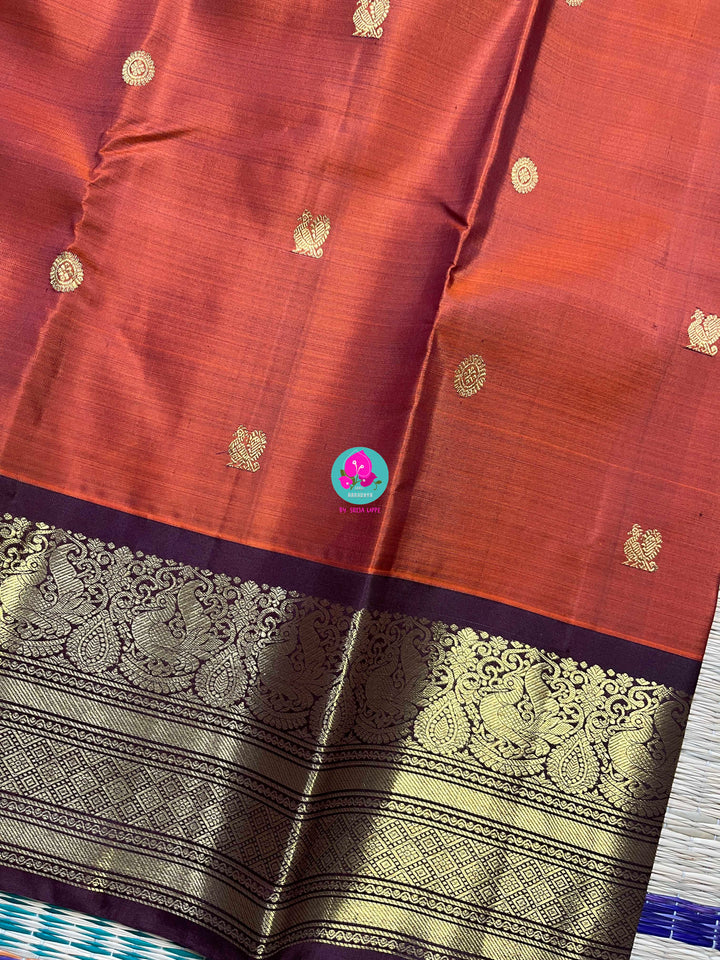 Pure Kanchipattu saree in vintage rust orange and brown border with hand embroidered blouse