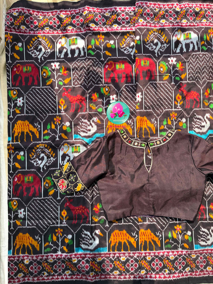 The Mahogany Menagerie: Pure Deep Brown Ikkat Silk Saree with Two side patola border