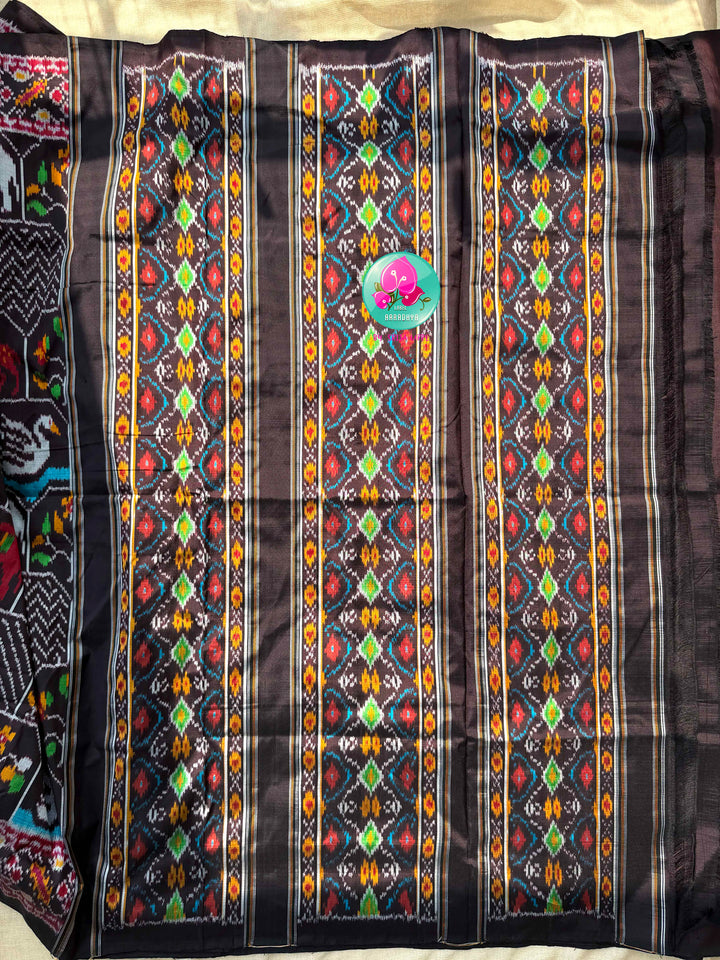 The Mahogany Menagerie: Pure Deep Brown Ikkat Silk Saree with Two side patola border