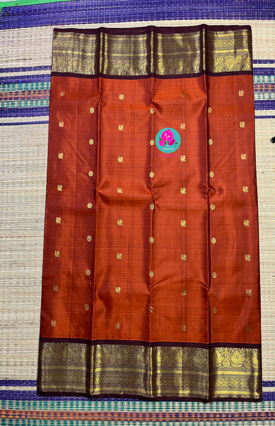 Pure Kanchipattu saree in vintage rust orange and brown border with hand embroidered blouse
