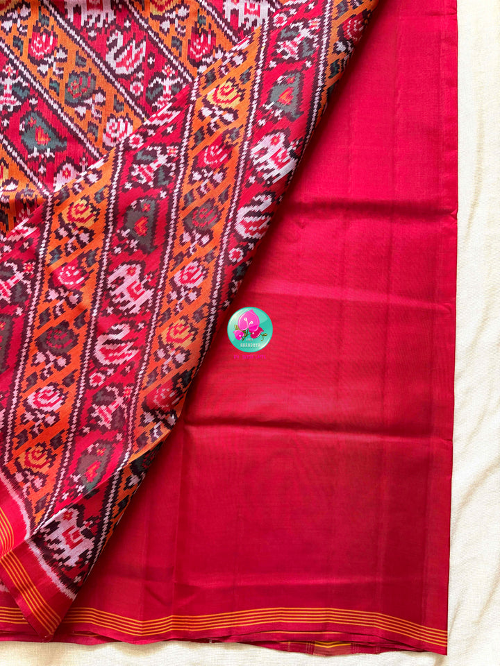 The Sunburst Heritage: 8-Ply Patan Patola Saree in Vibrant Orange & Red