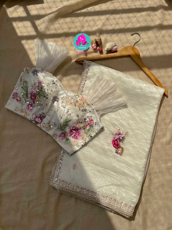 Soft crush organza saree with hand embroidery and Embellished floral blouse