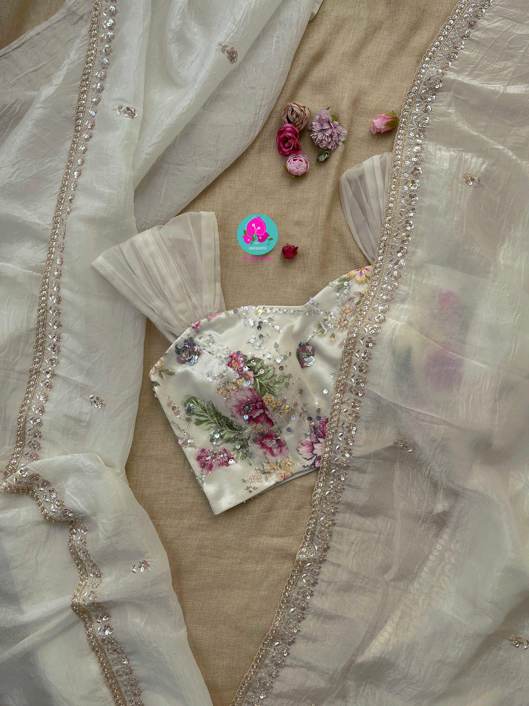 Soft crush organza saree with hand embroidery and Embellished floral blouse