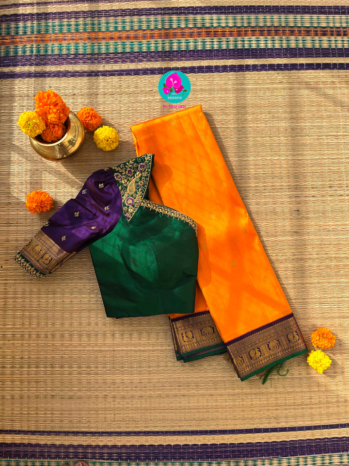 Pure Kanchipattu handloom saree in traditional peacock motifs paired with hand embroidered blouse