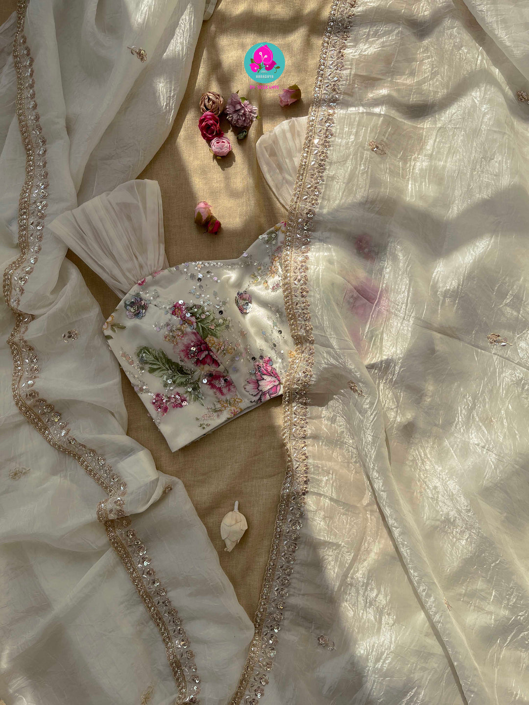 Soft crush organza saree with hand embroidery and Embellished floral blouse