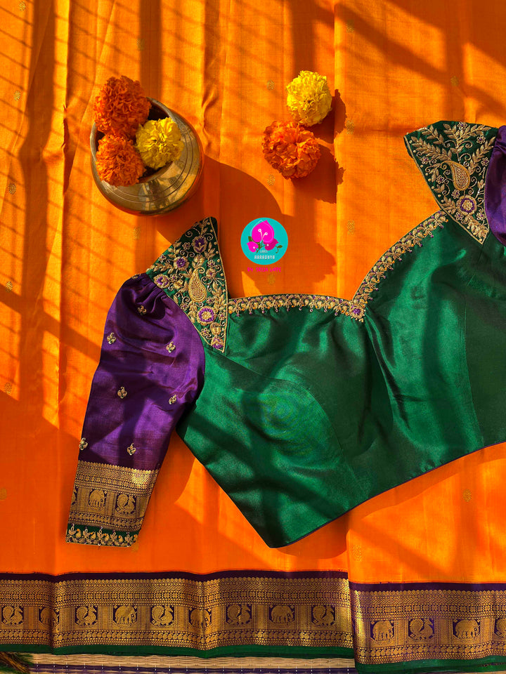 Pure Kanchipattu handloom saree in traditional peacock motifs paired with hand embroidered blouse