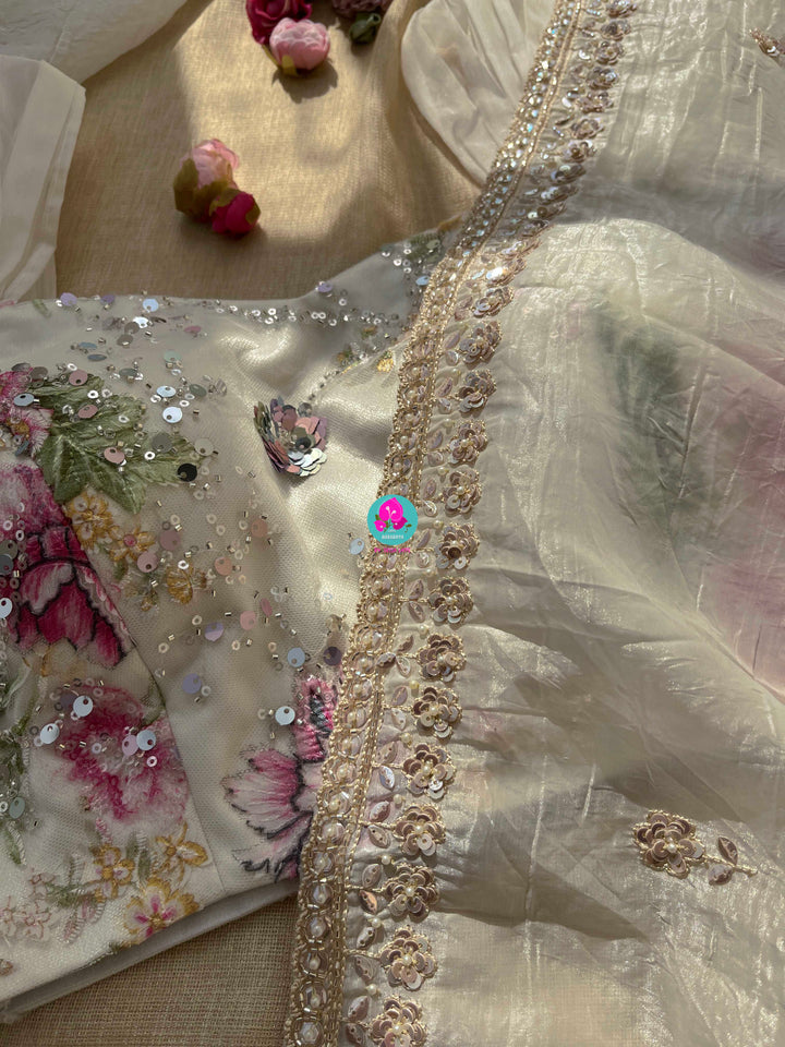 Soft crush organza saree with hand embroidery and Embellished floral blouse