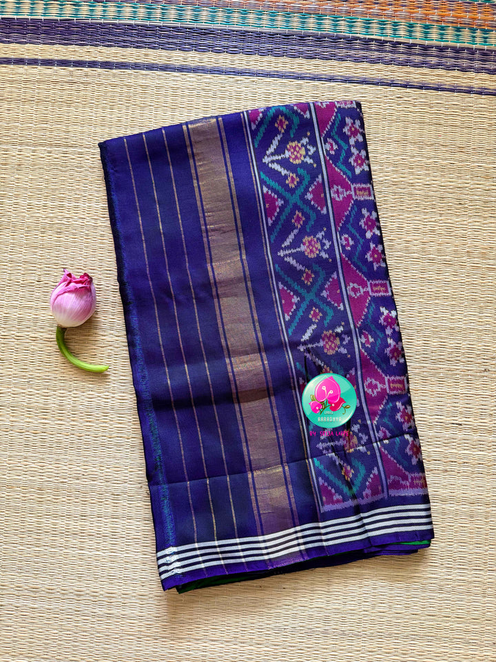 The Mirror of Mastery: Reversible Emerald & Amethyst Twill Patola Saree