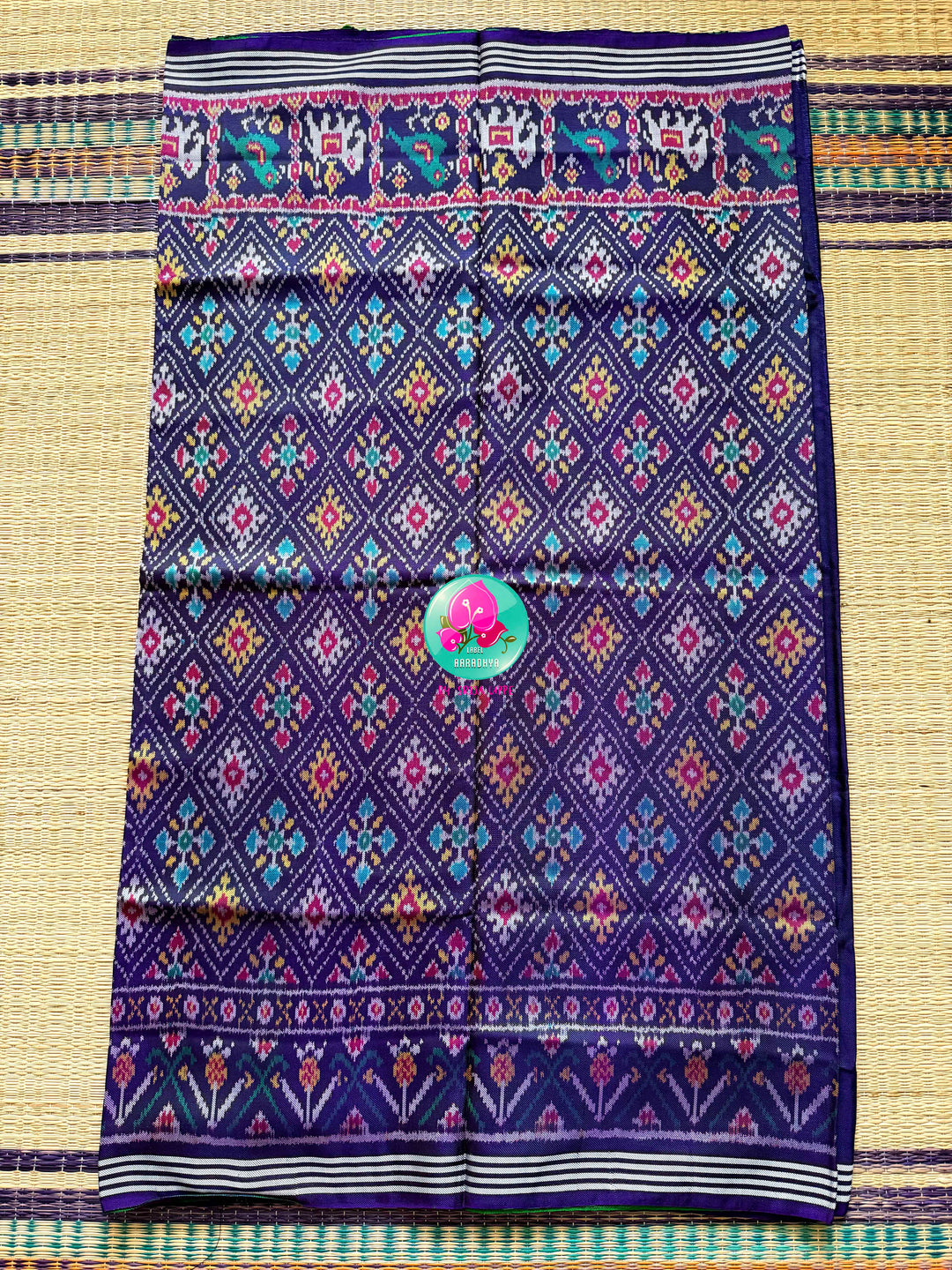 The Mirror of Mastery: Reversible Emerald & Amethyst Twill Patola Saree
