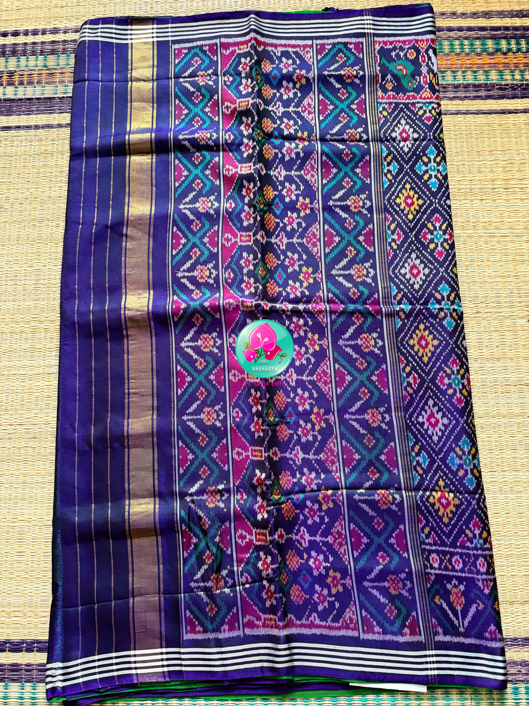 The Mirror of Mastery: Reversible Emerald & Amethyst Twill Patola Saree