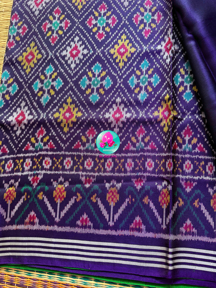 The Mirror of Mastery: Reversible Emerald & Amethyst Twill Patola Saree