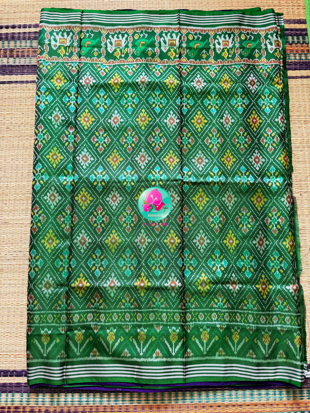 The Mirror of Mastery: Reversible Emerald & Amethyst Twill Patola Saree